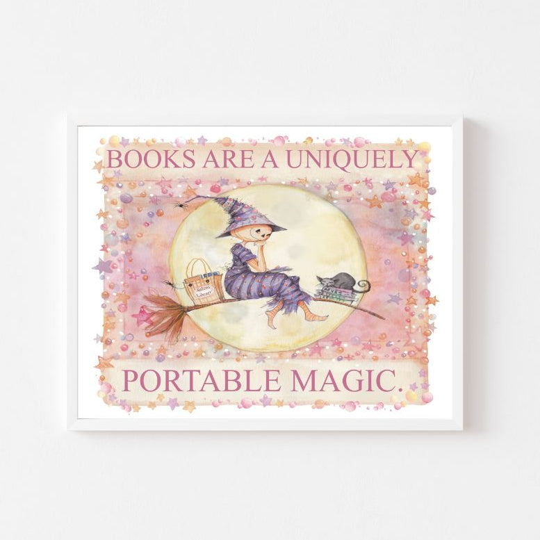 Framed print with a witch on a broomstick and text 'Books are a uniquely portable magic' on a white background.